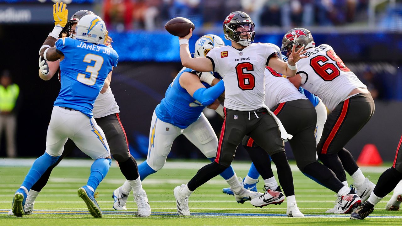 Tampa Bay Buccaneers quarterback Baker Mayfield (6) throws a pass during the first half of an NFL football game against the Los Angeles Chargers, Sunday, Dec. 15, 2024, in Inglewood, Calif. (AP Photo/Ryan Sun)