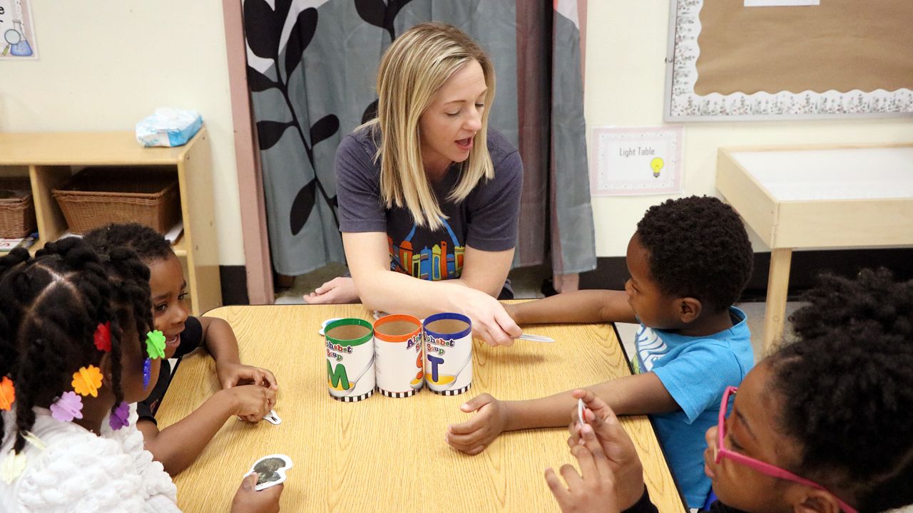 Patrick Henry Downtown Academy preschool teacher Lindsey Munnelly tests students on letters and sounds Wednesday, March 6. (Spectrum News/Elizabeth Barmeier)