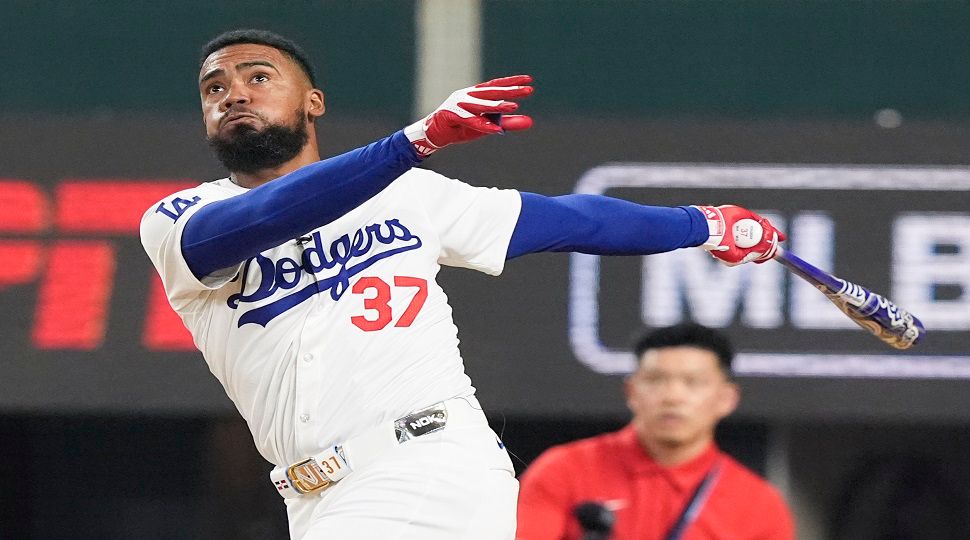 National League's Teoscar Hernandez, of the Los Angeles Dodgers, follows through during the MLB baseball All-Star Home Run Derby, Monday, July 15, 2024, in Arlington, Texas. (AP Photo/LM Otero)