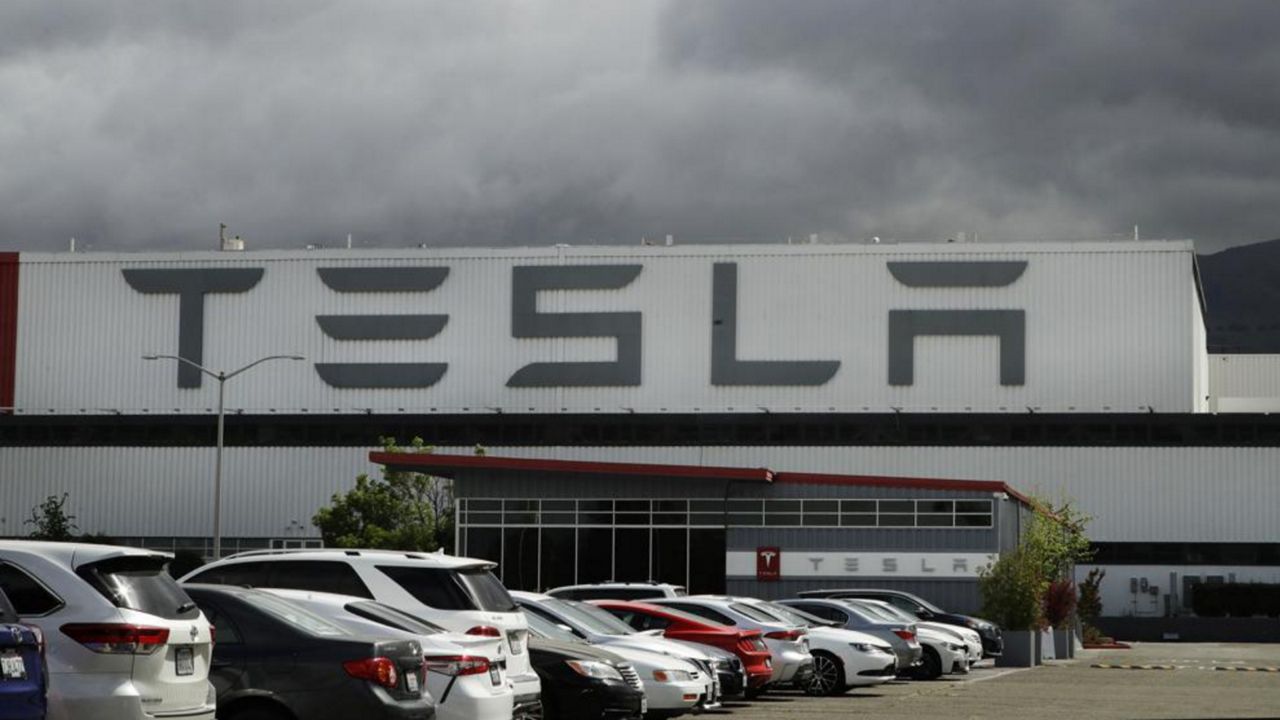 A Tesla parking lot. (AP Images)