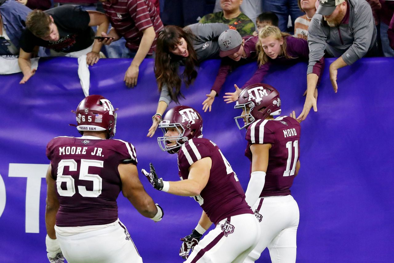 Mond leads A&M to 2421 win over Oklahoma St. in Texas Bowl