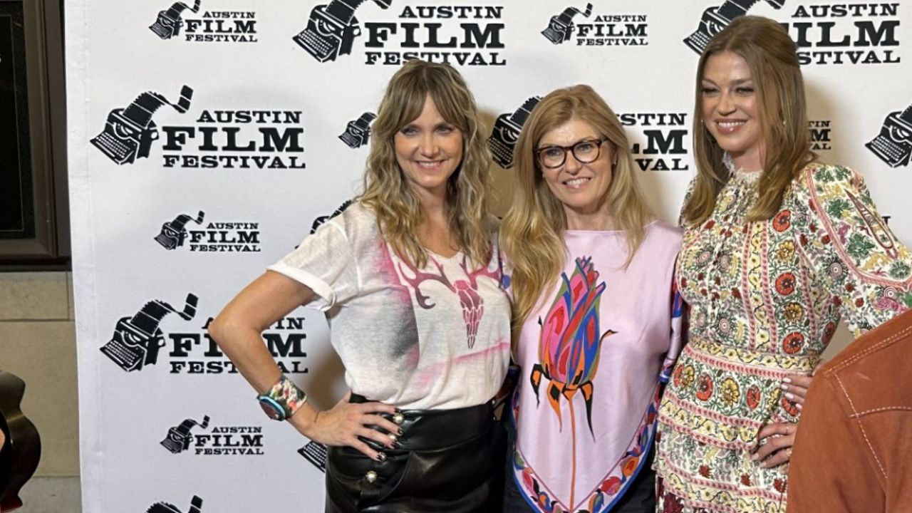 Julia Barnett, Connie Britton and Adrianne Palicki pose for a picture on the red carpet of Texas Cult House at Austin Film Festival. (Spectrum News/Kelsey Leffingwell)