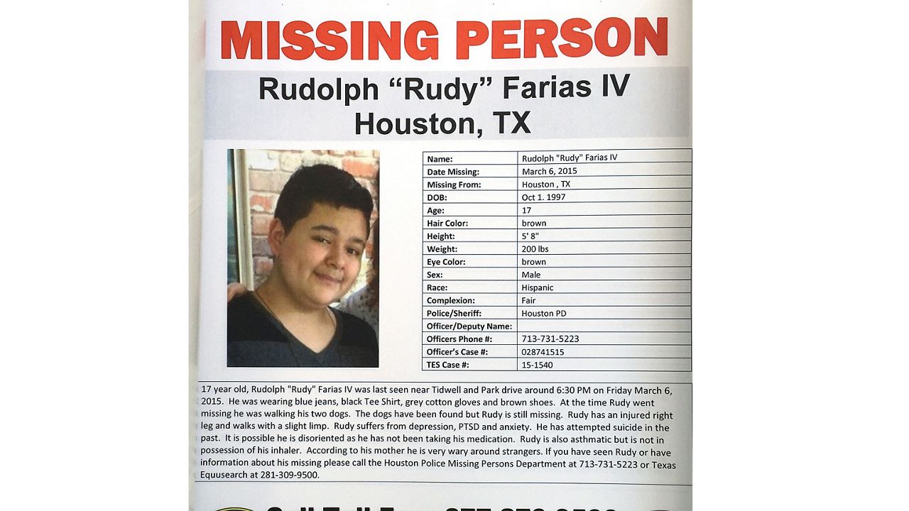 A missing poster for Rudolph "Rudy" Farias IV is shown during the Missing Person Day event at City Hall Sunday, Jan. 31, 2016, in Houston. (Texas EquuSearch/Courtesy of Houston Chronicle via AP)