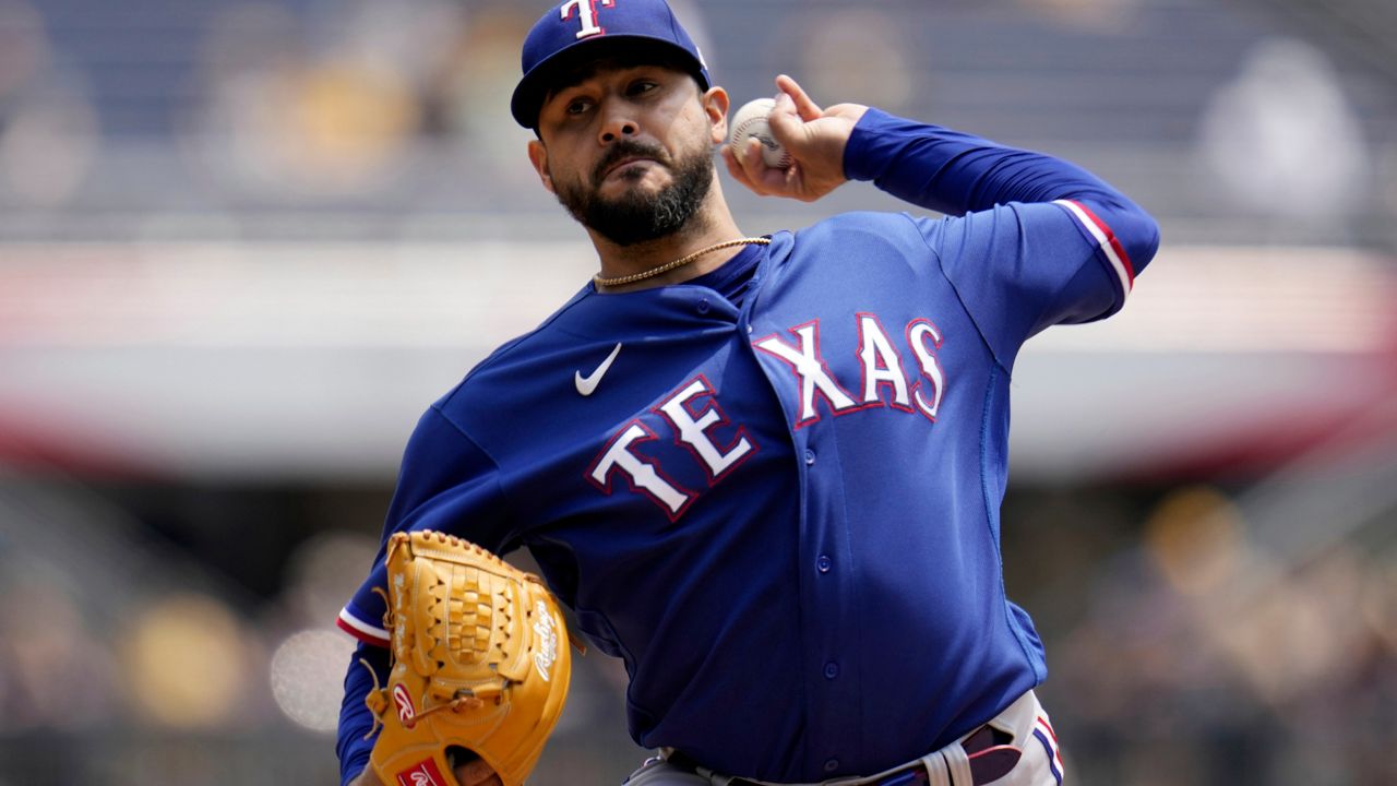 Smith picks up 100th save as Rangers top Pirates 3-2