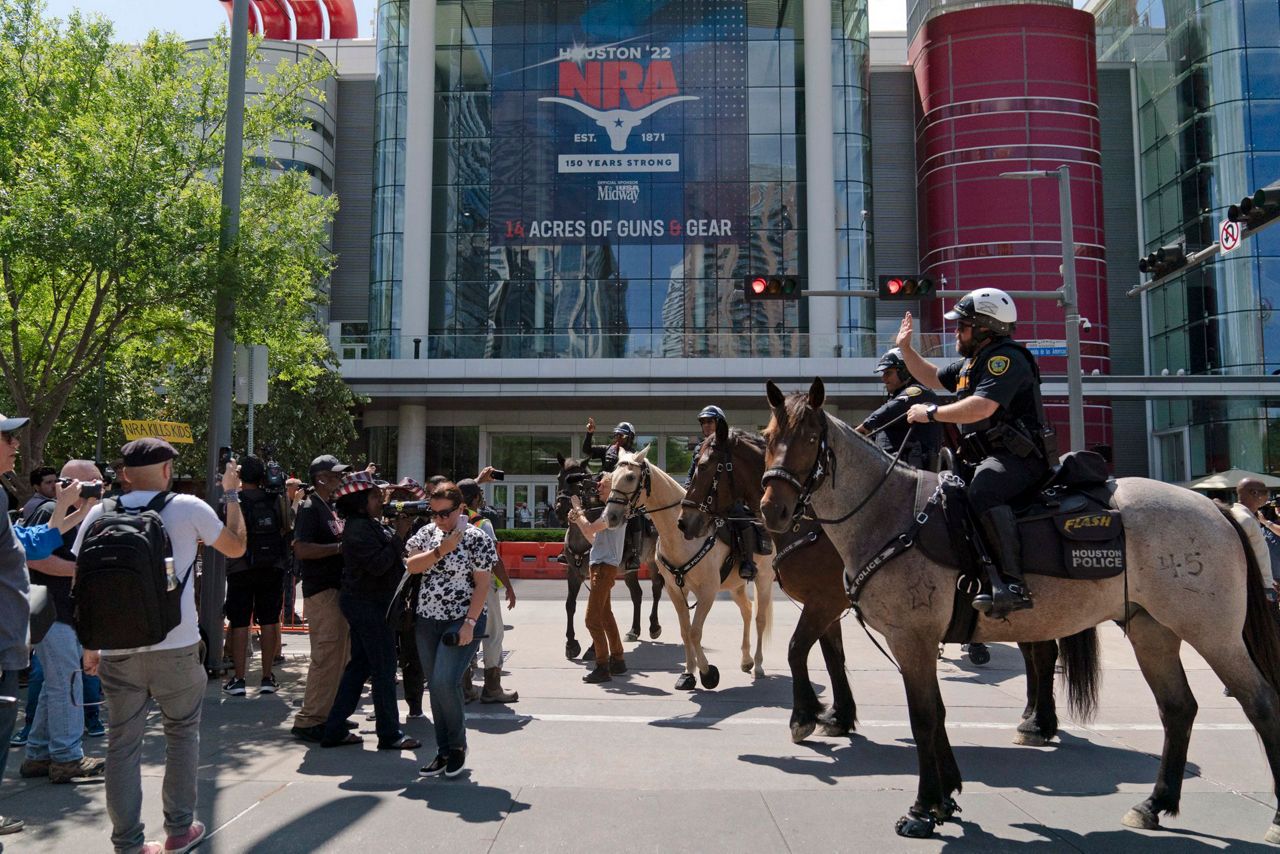 NRA opens gun convention in Texas after school massacre