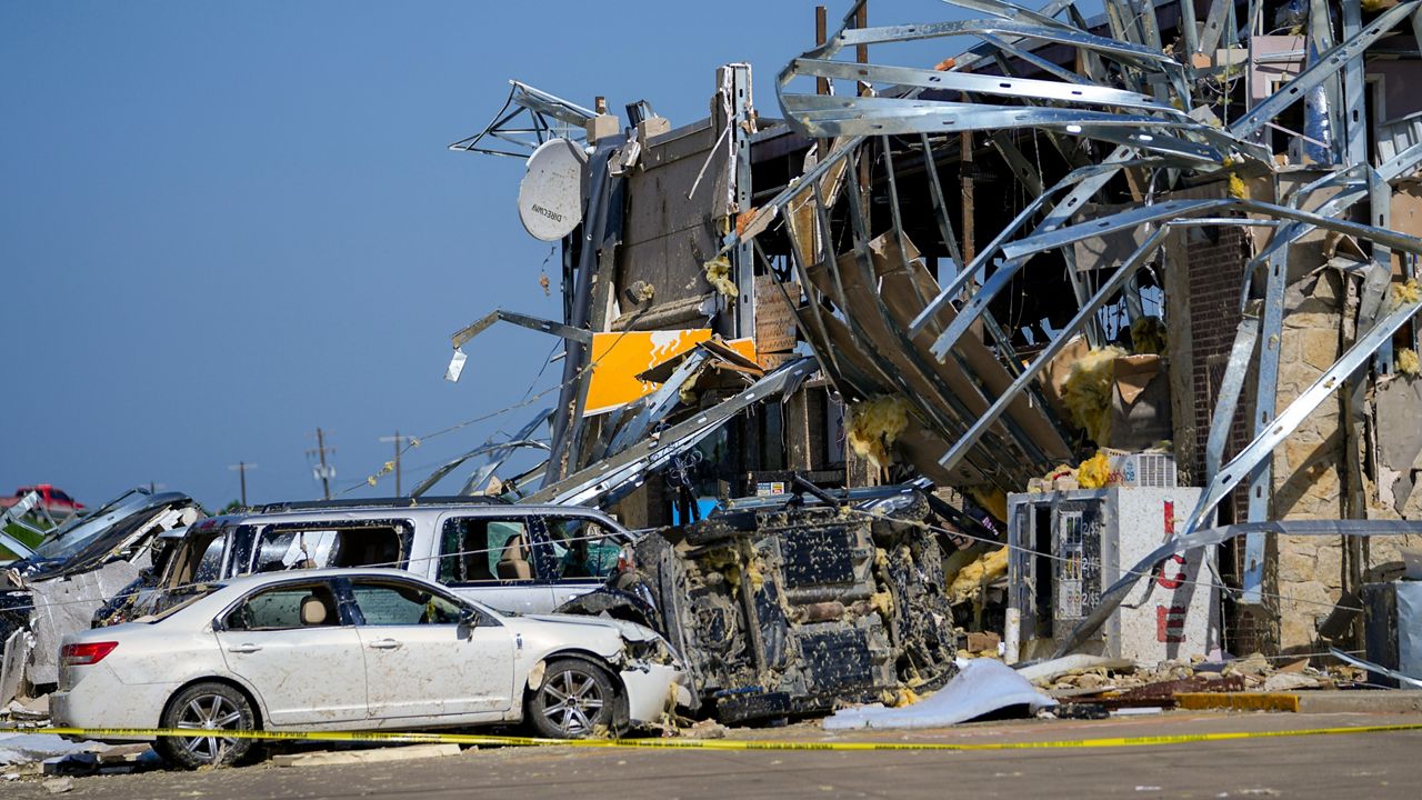 Damage is seen at a truck stop the morning after a tornado rolled through, Sunday, May 26, 2024, in Valley View, Texas. (AP Photo/Julio Cortez)