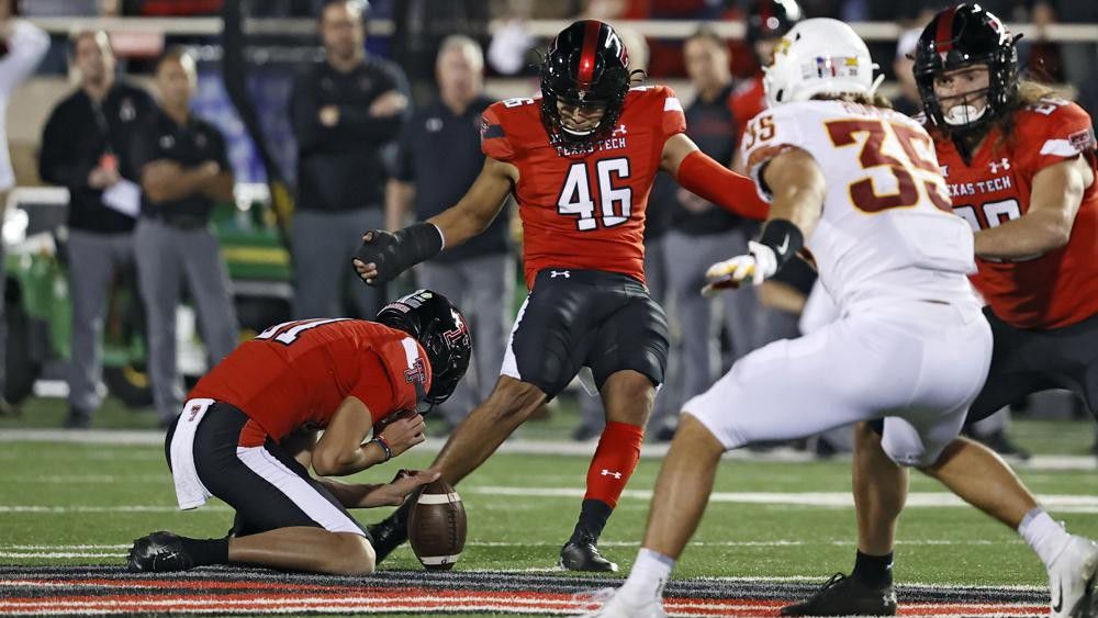 Texas Tech's Jonathan Garibay (46) kicks the game-winning 62-yard field goal during the second half of an NCAA college football game against Iowa State, Saturday, Nov. 13, 2021, in Lubbock, Texas. (AP Photo/Brad Tollefson)