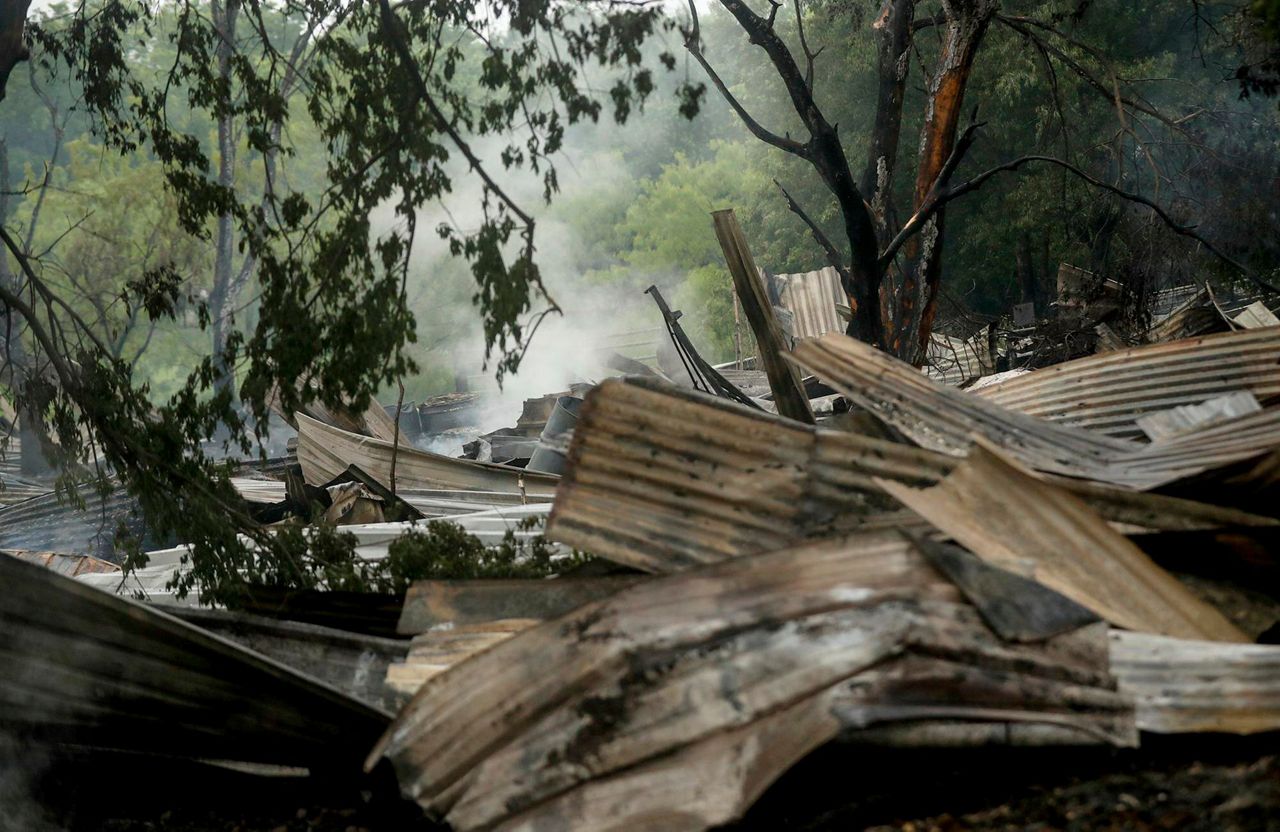 Train cars carrying ethanol catch fire in Texas derailment