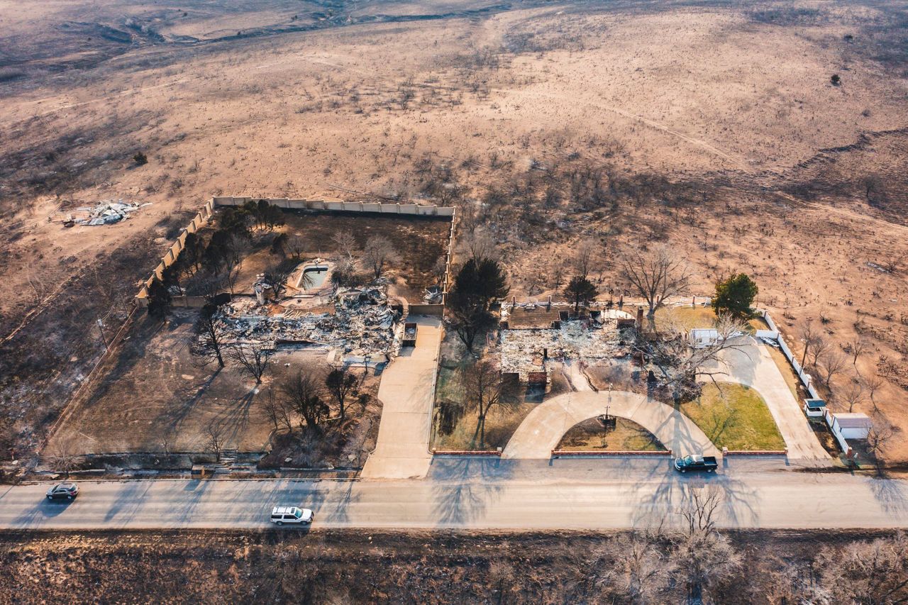 Flames menace multiple towns as wildfire grows into one of the largest ...
