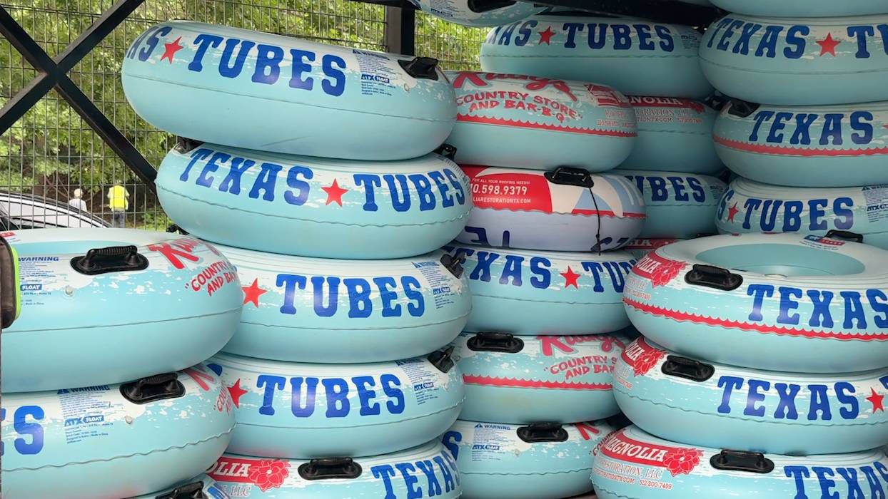 Tubes stacked up along the Comal River in New Braunfels. (Spectrum News 1/Amber Hughes)