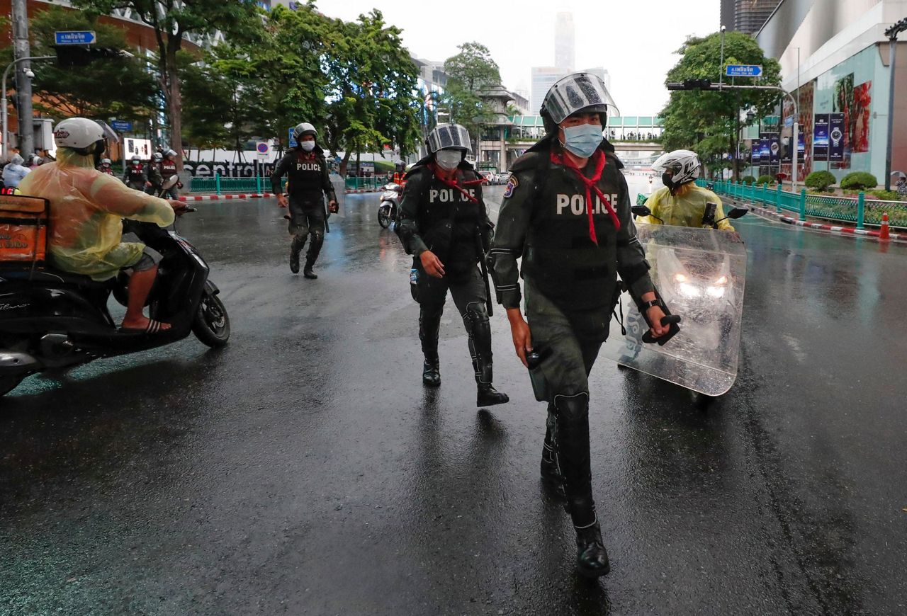 2 charged with endangering queen as Thai protests continue