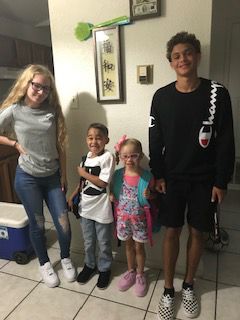 The Brown kids ready for Pre-k, first grade, 10th and 11th grades
