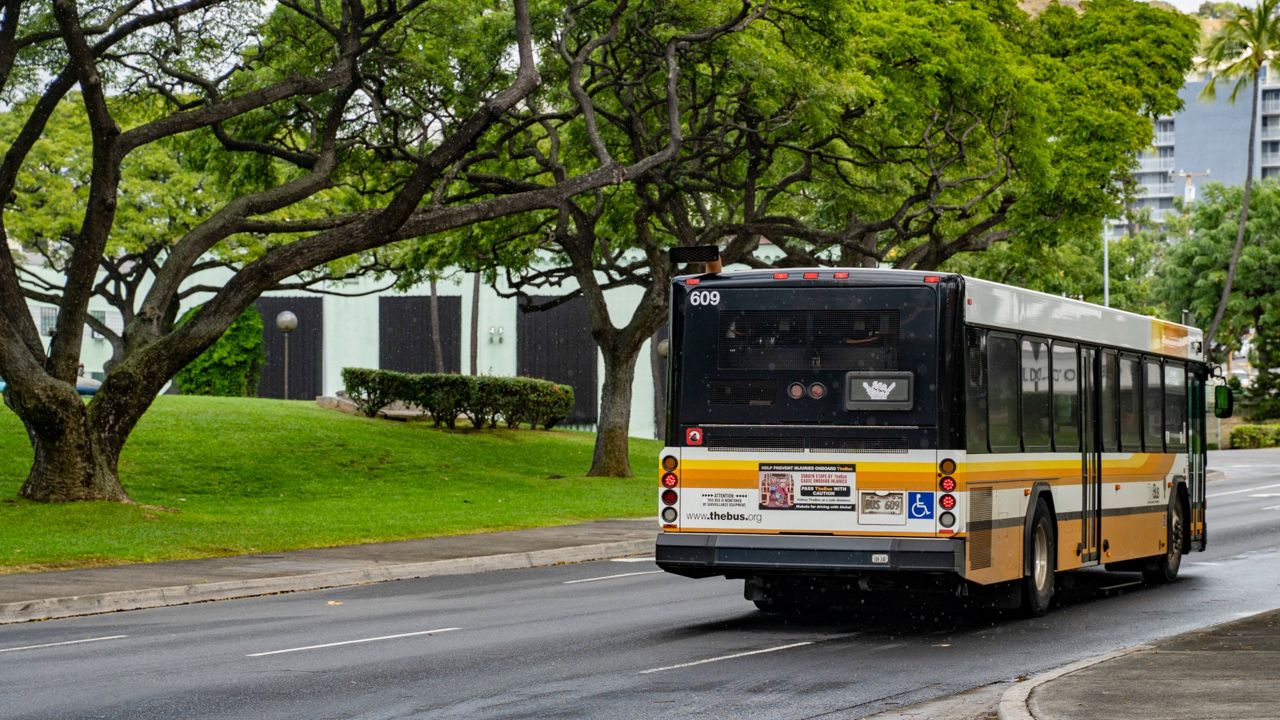 A Honolulu City Bus, TheBus, displays a shaka after merging to Alapai Street on Wednesday, March 6, 2024, in Honolulu, Hawaii. (AP Photo/Mengshin Lin)