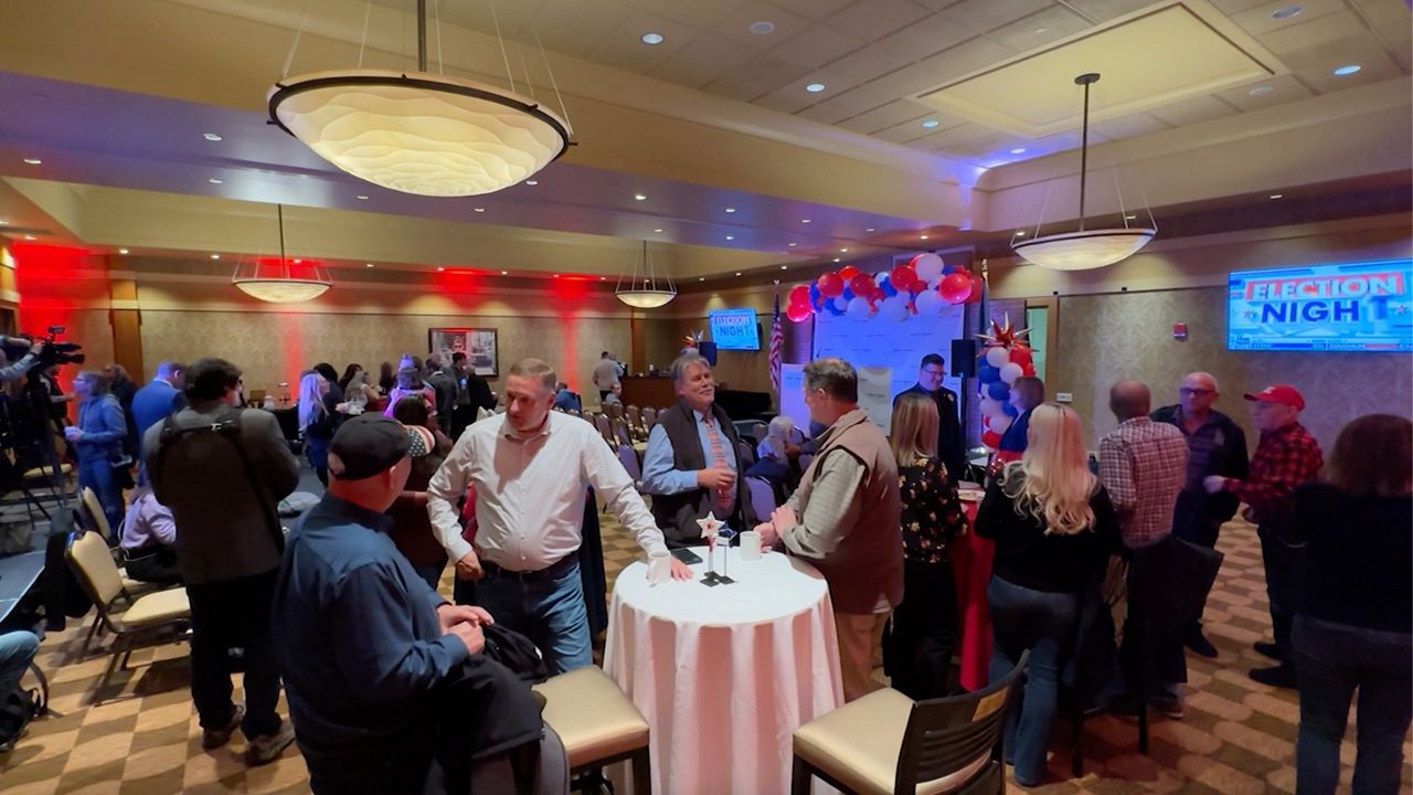 Dozens of supporters of Republican Second Congressional District Candidate Austin Theriault gathered at a watch party at the Hollywood Casino Hotel in Bangor Tuesday night. Theriault is in a tight race with Democratic Incumbent Jared Golden. (Spectrum News/Sean Murphy)