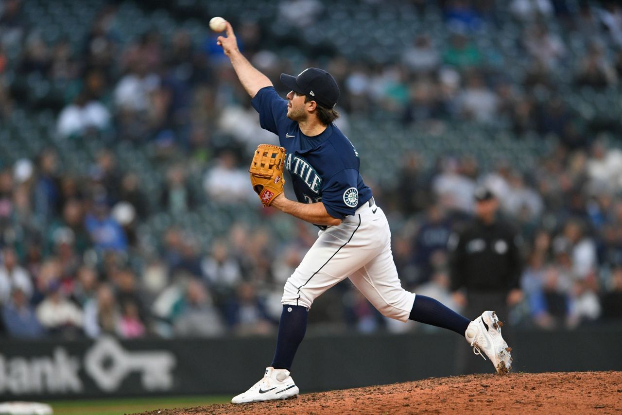 Mitch Haniger hits two HRs and Mariners win on another wild pitch against  A's