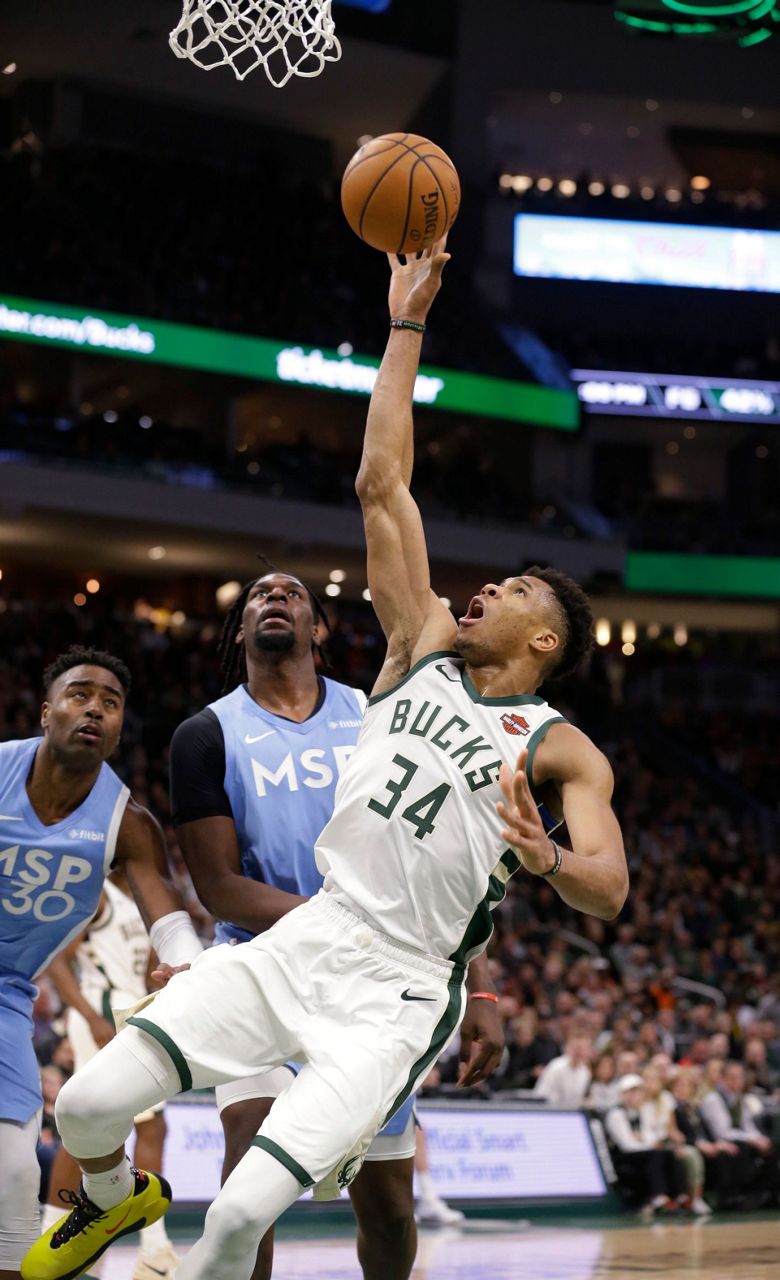 Antetokounmpo Scores 32, Bucks Hold Off Wolves 106-104