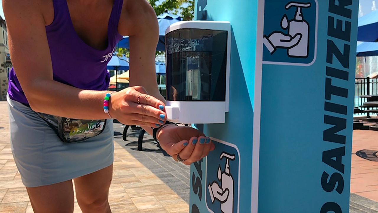 A hand sanitizer dispenser at Kings Island.