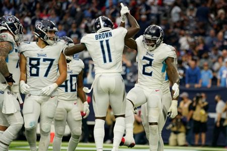 Tennessee Titans beat Houston Texans to clinch AFC's number one seed