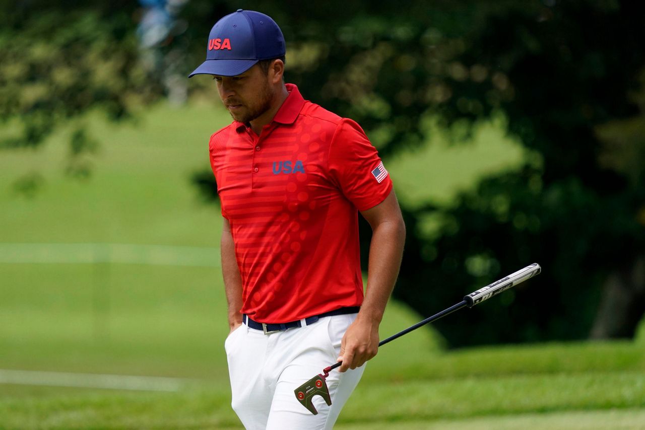 Schauffele has big finish and 1-shot lead in Olympic golf