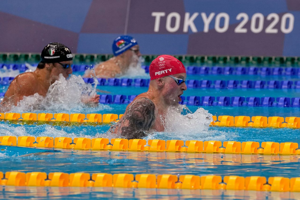 britain-s-adam-peaty-repeats-as-breaststroke-olympic-champ