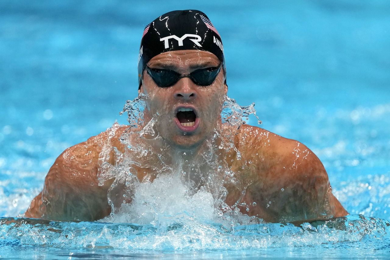 US swimmer Andrew goes maskless behind scenes at Olympics