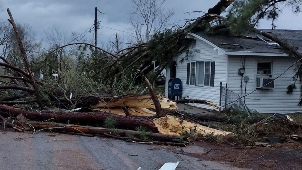 A large tree landed on the roof of the Glenallen, Mo. post office following a reported tornado touchdown. (Courtesy: Joshua Wells/Facebook)