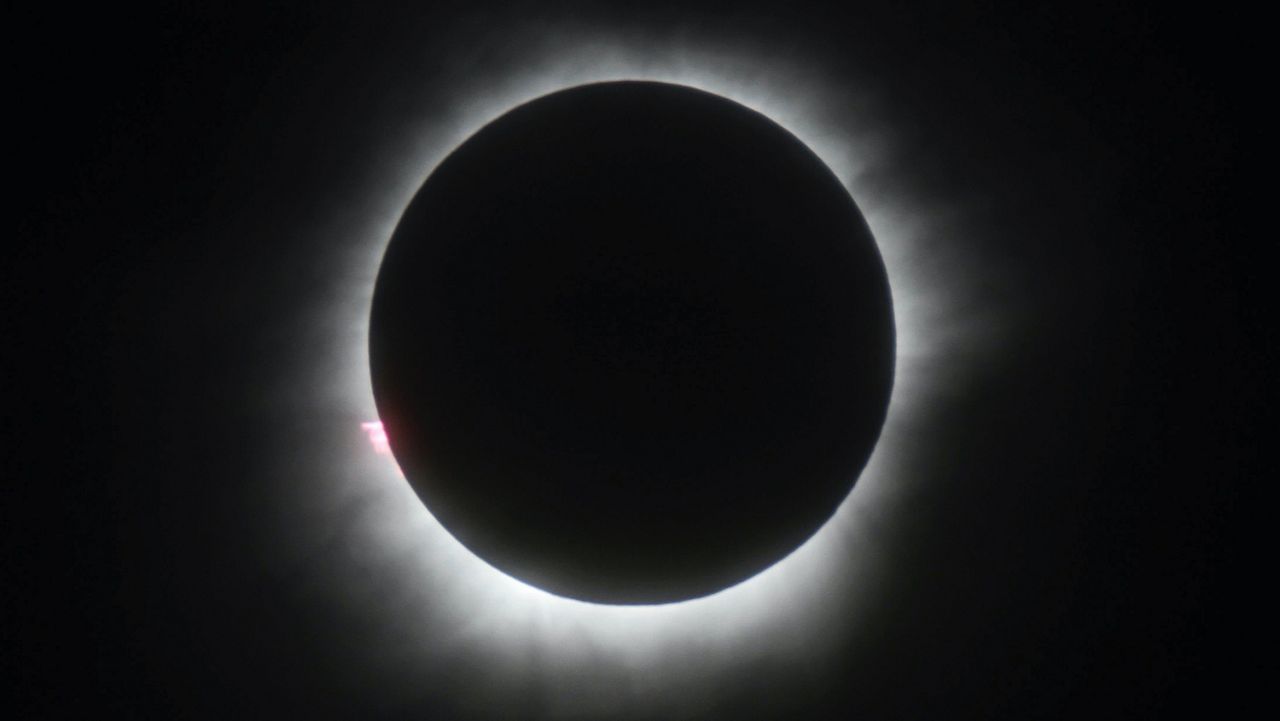 A total solar eclipse is seen in Belitung, Indonesia, Wednesday, March 9, 2016. (AP Photo)