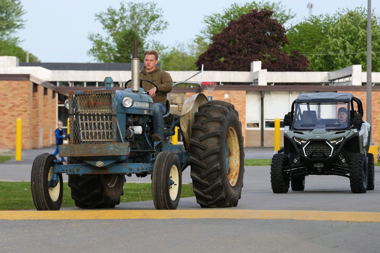 Tractors, ATVs and golf carts, oh my: Michigan seniors arrive at school ...