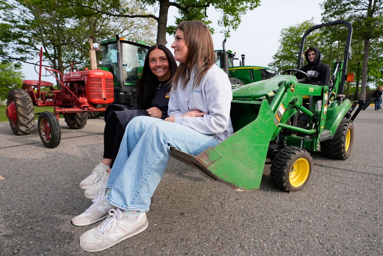 Tractors, ATVs and golf carts, oh my: Michigan seniors arrive at school ...