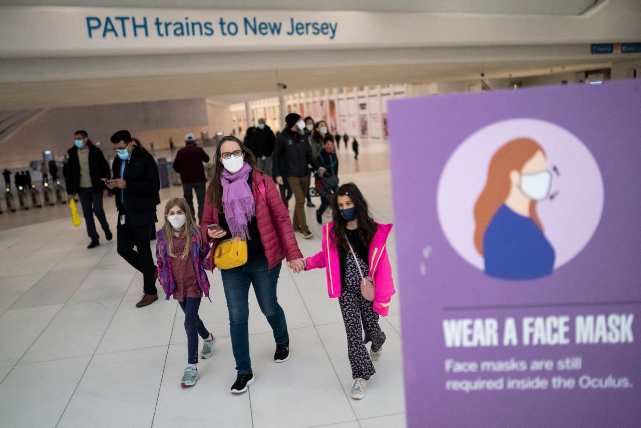 Cheers, fear as judge strikes down U.S. transit mask mandate