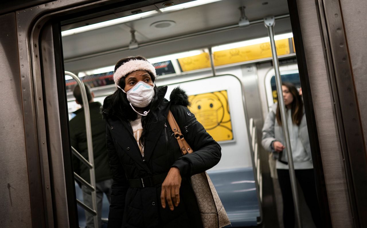 Cheers, fear as judge strikes down U.S. transit mask mandate