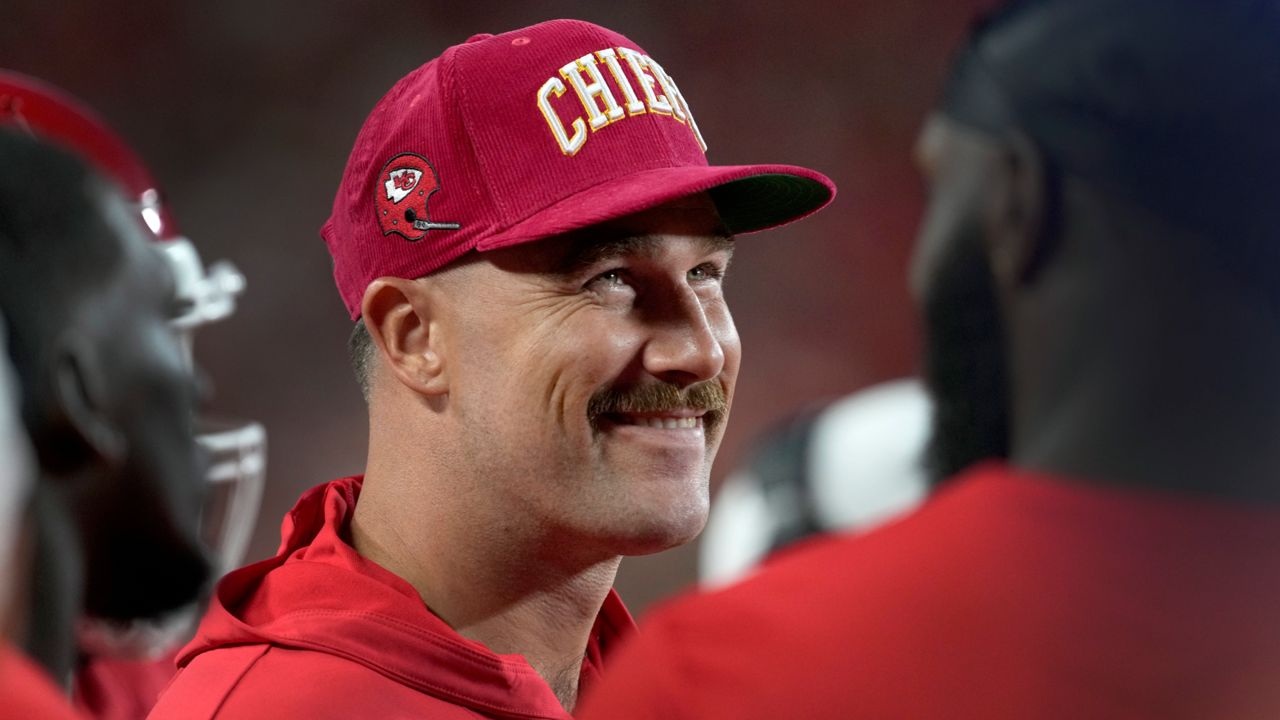 Kansas City Chiefs tight end Travis Kelce smiles on the sidelines during the first half of an NFL preseason football game against the Chicago Bears Thursday, Aug. 22, 2024, in Kansas City, Mo.