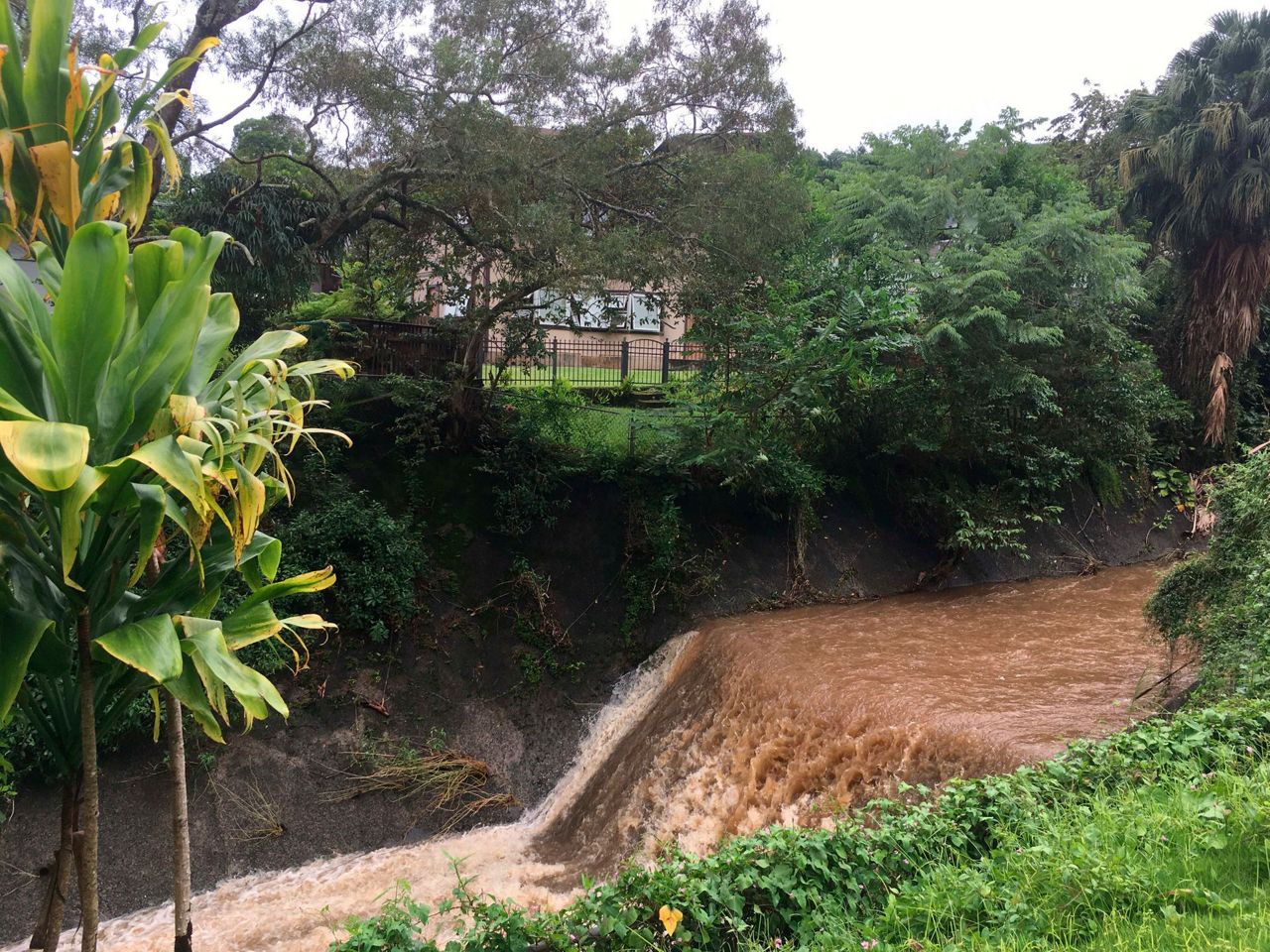 Tropical storm dumps rain on Hawaii while crossing state