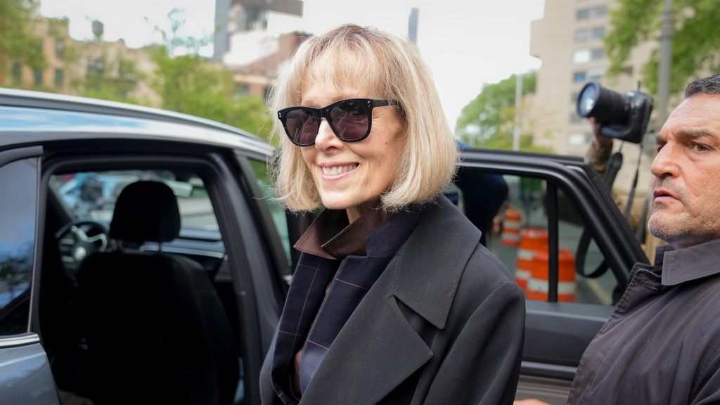 Former advice columnist E. Jean Carroll, left, leaves Manhattan federal court, Thursday, May 4, 2023, in New York. (AP Photo/John Minchillo)