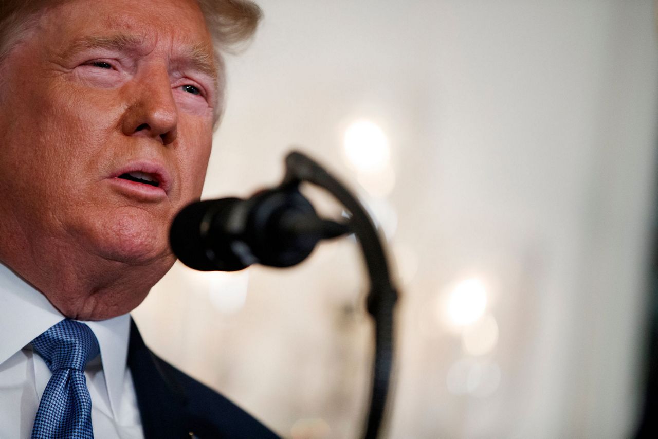 The Latest: Trump calls 2 mass shootings 'evil attacks'