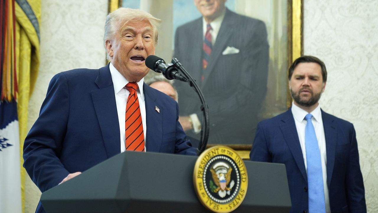 President Donald Trump speaks before Steve Witkoff is sworn as special envoy during a ceremony in the Oval Office of the White House, Tuesday, May 6, 2025, in Washington, as Vice President JD Vance watches. (AP Photo/Mark Schiefelbein)