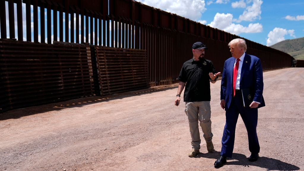 Republican presidential nominee former President Donald Trump listens to Paul Perez, president of the National Border Patrol Council, as he tours the southern border with Mexico, on Aug. 22, 2024, in Sierra Vista, Ariz. (AP Photo/Evan Vucci)