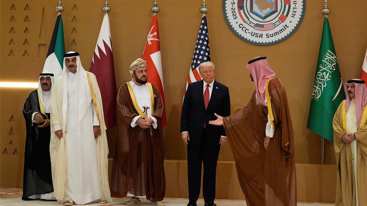 Saudi Crown Prince Mohammed bin Salman, right, welcomes President Donald Trump for the group photo with Gulf Cooperation Council leaders during the GCC Summit in Riyadh, Saudi Arabia, Wednesday, May 14, 2025. (AP Photo/Alex Brandon)