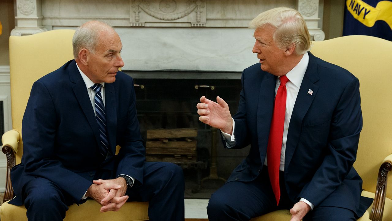 In this July 31, 2017, file photo, President Donald Trump talks with new White House Chief of Staff John Kelly after he was privately sworn in during a ceremony in the Oval Office in Washington. (AP Photo/Evan Vucci, File)