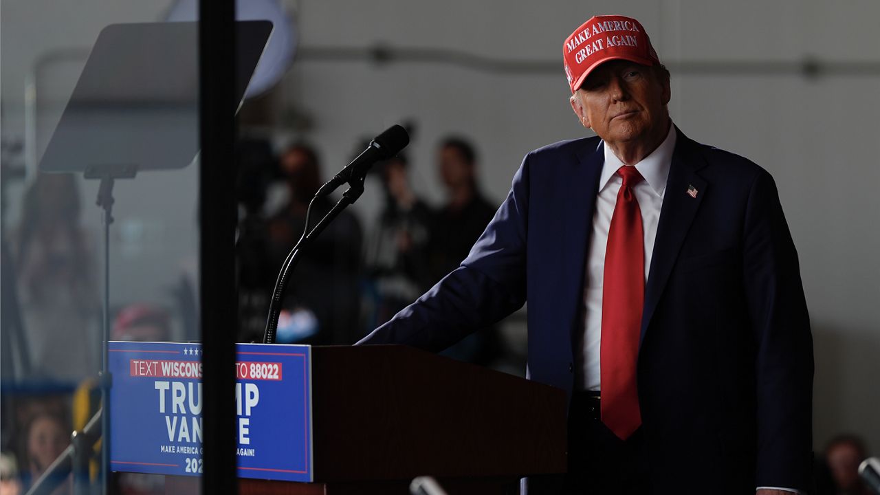 Republican presidential nominee former President Donald Trump speaks during a campaign rally at Dodge County Airport, Sunday, Oct. 6, 2024, in Juneau, Wis. (AP Photo/Julia Demaree Nikhinson)