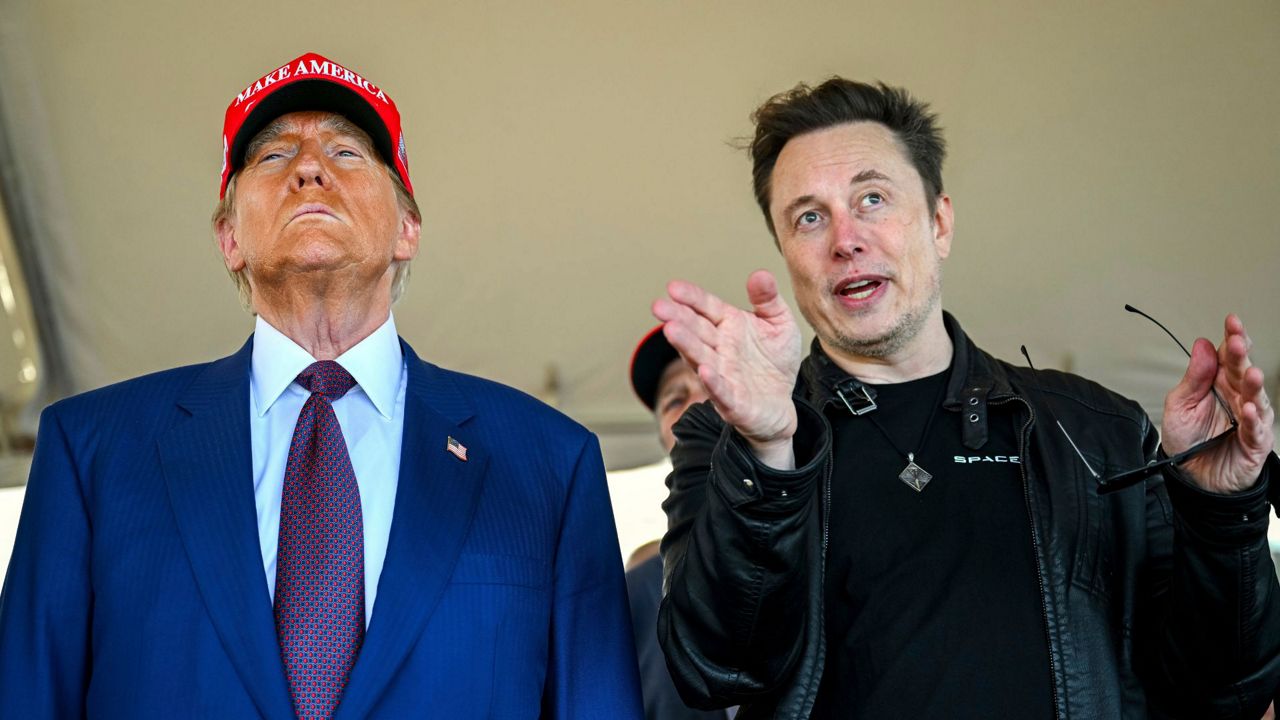 President-elect Donald Trump listens to Elon Musk as he arrives to watch SpaceX's mega rocket Starship lift off for a test flight from Starbase in Boca Chica, Texas, Nov. 19, 2024. (Brandon Bell/Pool via AP, File)