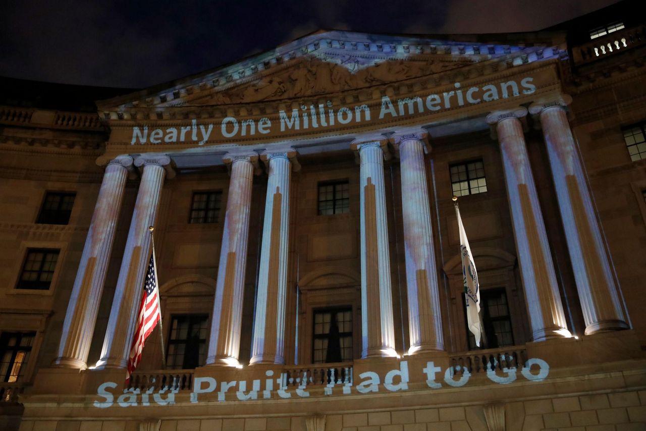 Anti-Trump images become big business for DC projectionist