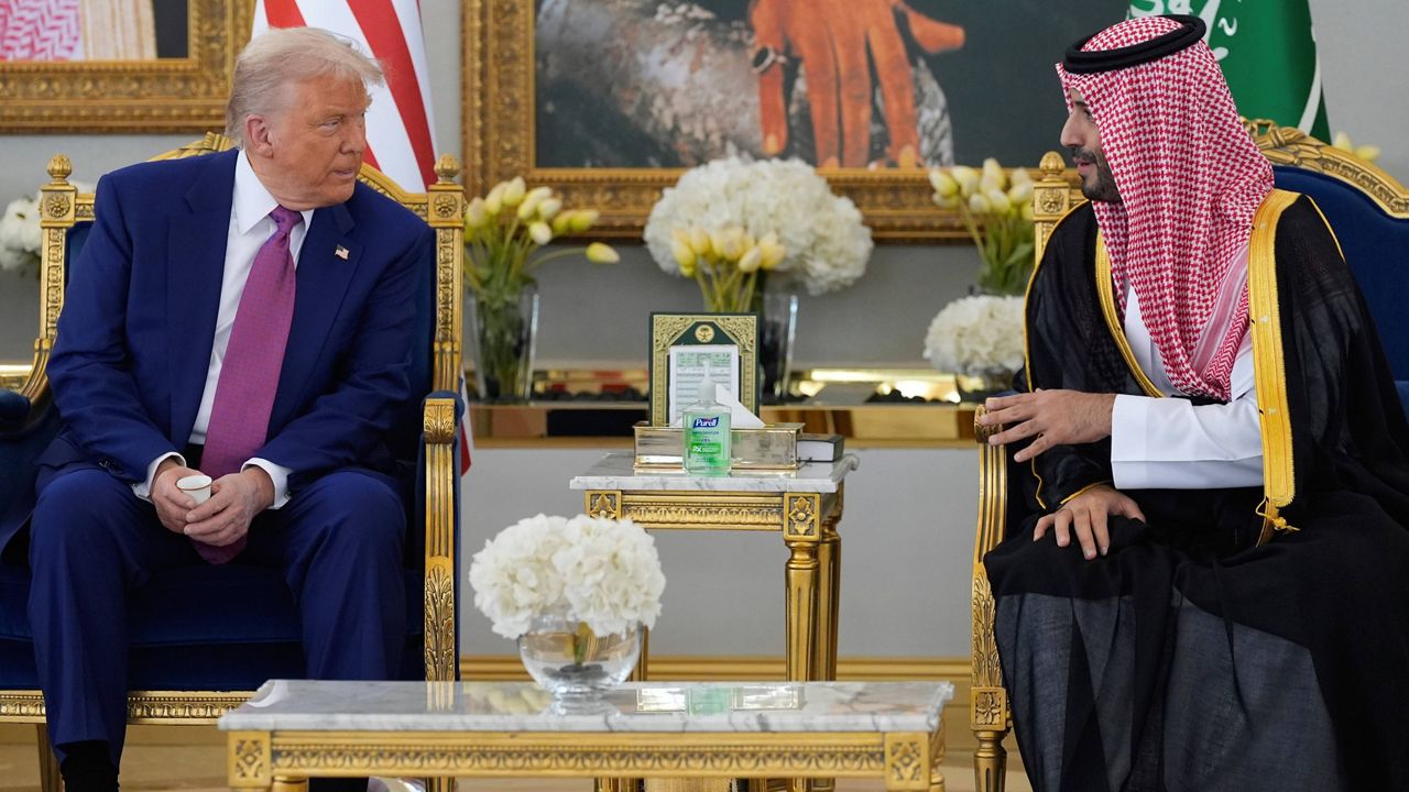 President Donald Trump speaks with Saudi Crown Prince Mohammed bin Salman during a coffee ceremony at the Royal Terminal of King Khalid International Airport in Riyadh, Saudi Arabia, Tuesday, May 13, 2025. (AP Photo/Alex Brandon)