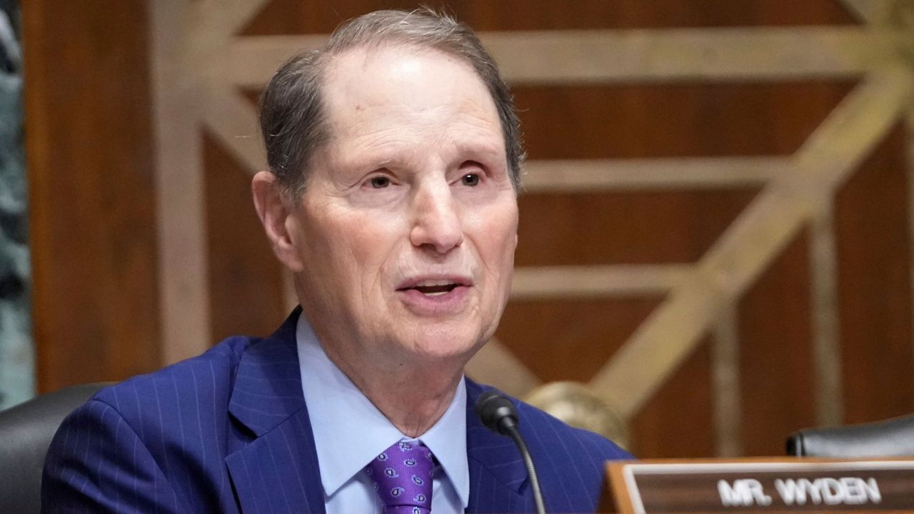 Sen. Ron Wyden, D-Ore., questions U.S. Trade Representative Jamieson Greer as he testifies before the Senate Finance Committee on Capitol Hill in Washington, Tuesday, April 8, 2025. (AP Photo/Mark Schiefelbein)