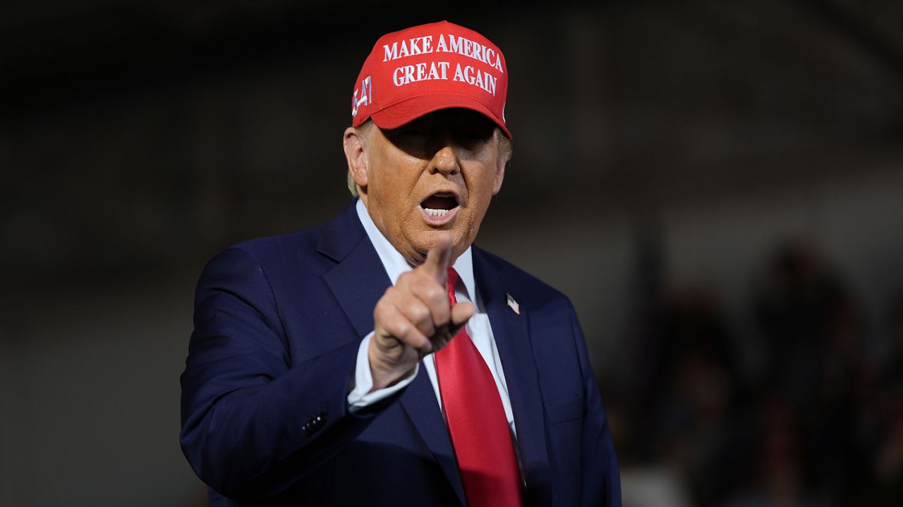 Republican presidential nominee former President Donald Trump arrives to speak during a campaign rally at Dodge County Airport, Sunday, Oct. 6, 2024, in Juneau, Wis. (AP Photo/Julia Demaree Nikhinson)