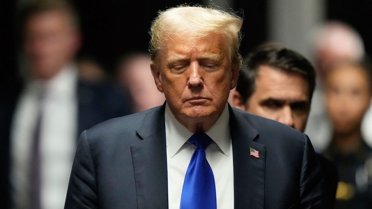 Former President Donald Trump walks to make comments to members of the media after a jury convicted him of felony crimes for falsifying business records in a scheme to illegally influence the 2016 election, at Manhattan Criminal Court, Thursday, May 30, 2024, in New York. (AP Photo/Seth Wenig, Pool)