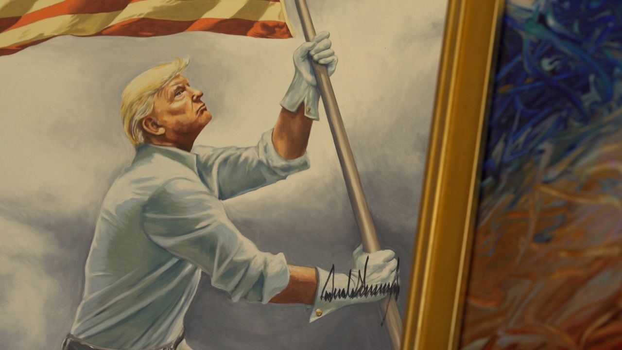 Artist Scott LoBaido portrays Trump as muscular and strong in his paintings. (Spectrum News)