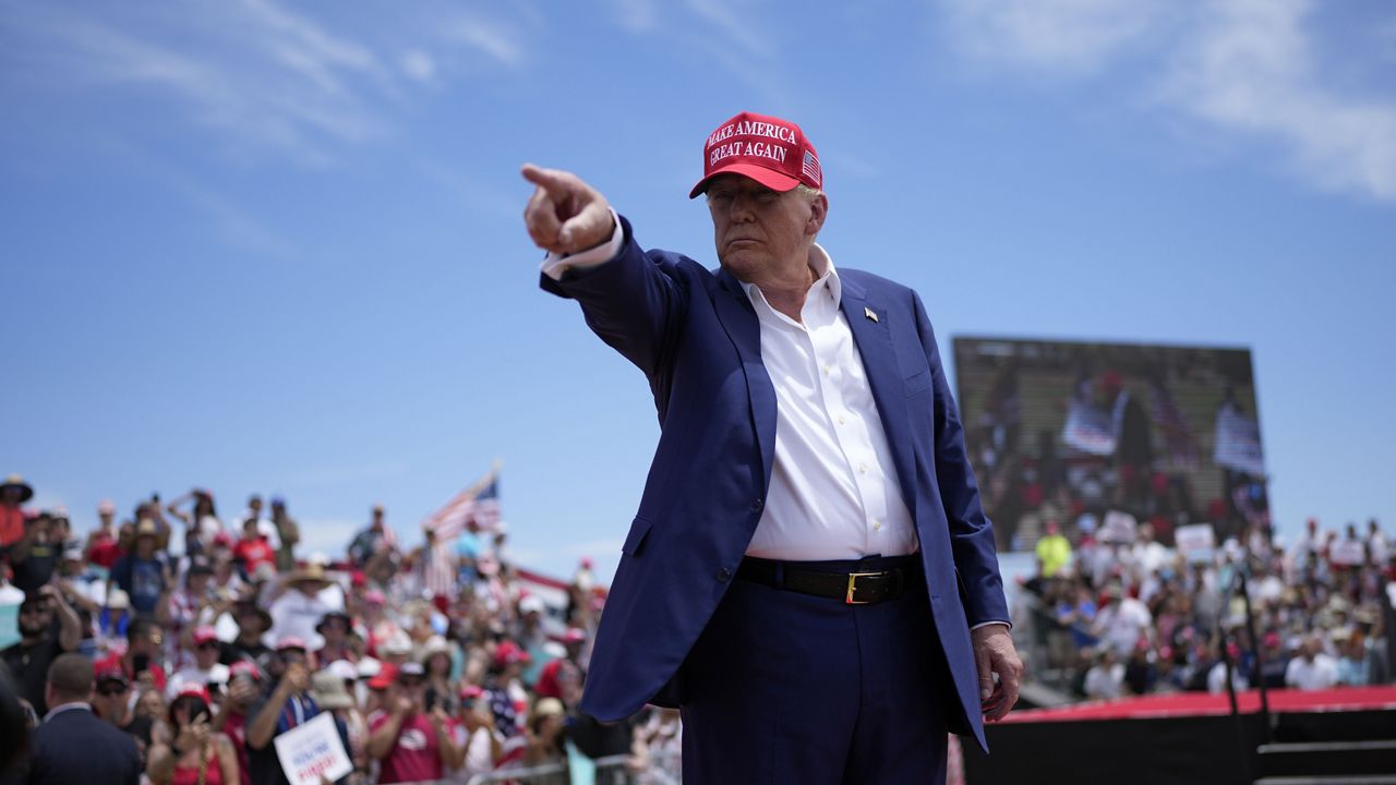 Republican presidential candidate, former President Donald Trump motions to the crowd after speaking at a campaign rally Sunday, June 9, 2024, in Las Vegas. (AP Photo/John Locher)