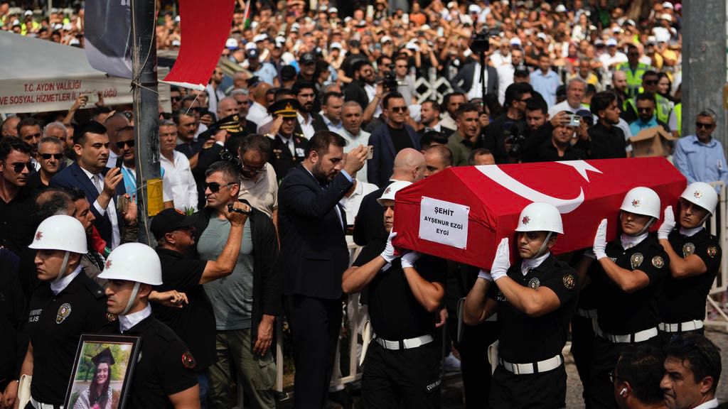 Turkish military police carry the coffin of Aysenur Ezgi Eygi, a 26 year-old Turkish-American activist killed by the Israeli military, for the funeral prayer outside the central mosque of Didim, Turkey, Saturday, Sept. 14, 2024,(AP Photo/Khalil Hamra)