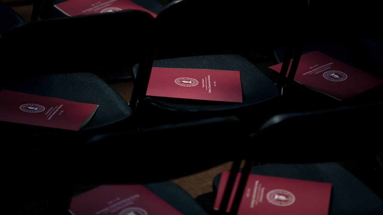 Commencement programs sit on seats during the Tuskegee University spring commencement, Saturday, May 9, 2015, in Tuskegee, Ala. (AP Photo/Brynn Anderson)